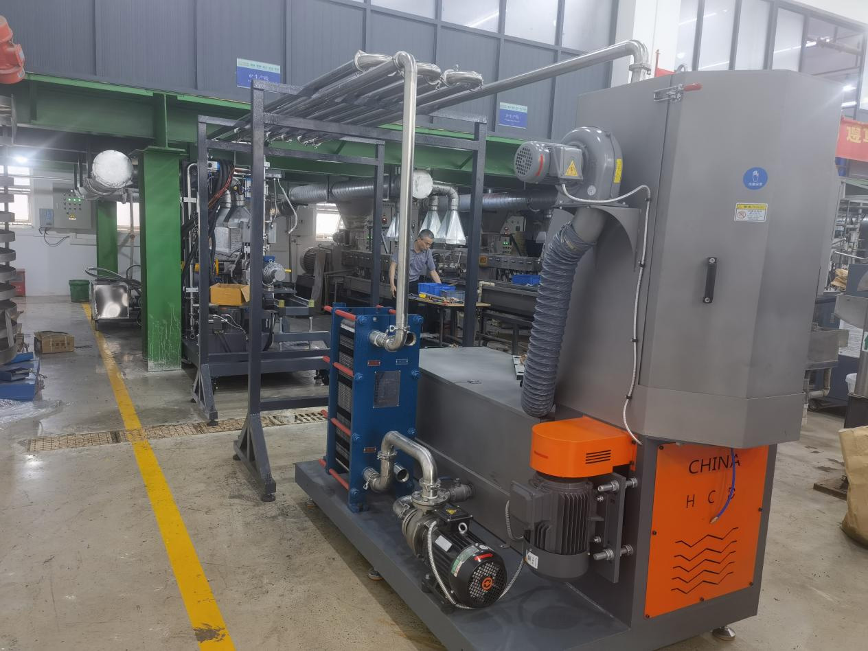 力塑(su)TPE引進雙螺(luo)桿擠齣機+水下切生産線自(zi)動化設備